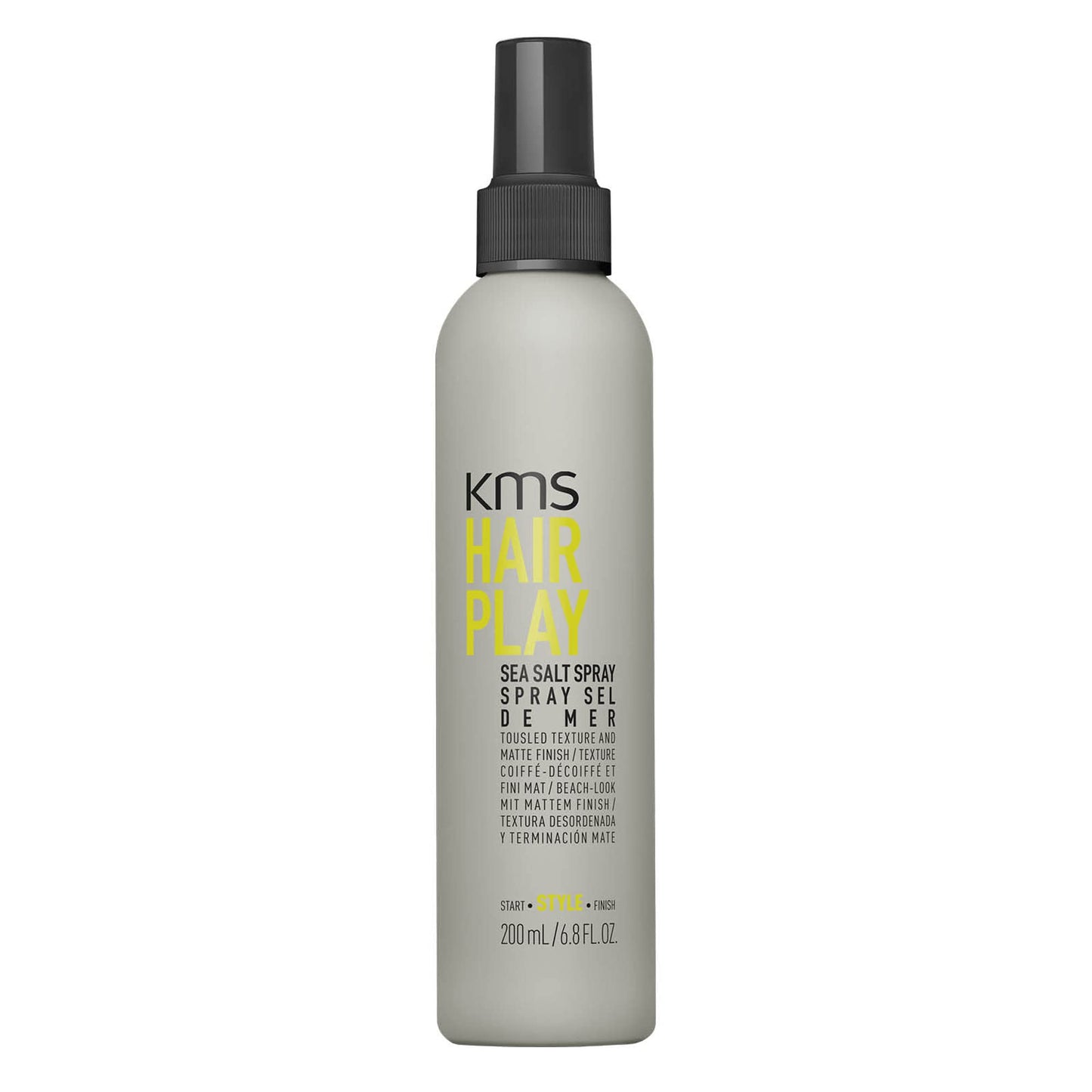 KMS Hair Play sea salt spray bottle on a white background