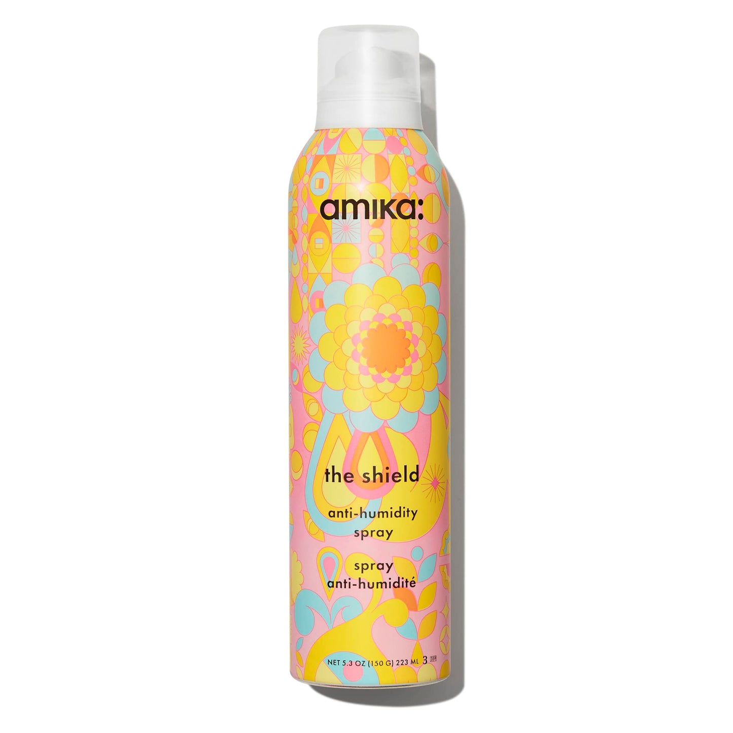 Amika anti-humidity spray bottle with colorful floral design on a white background