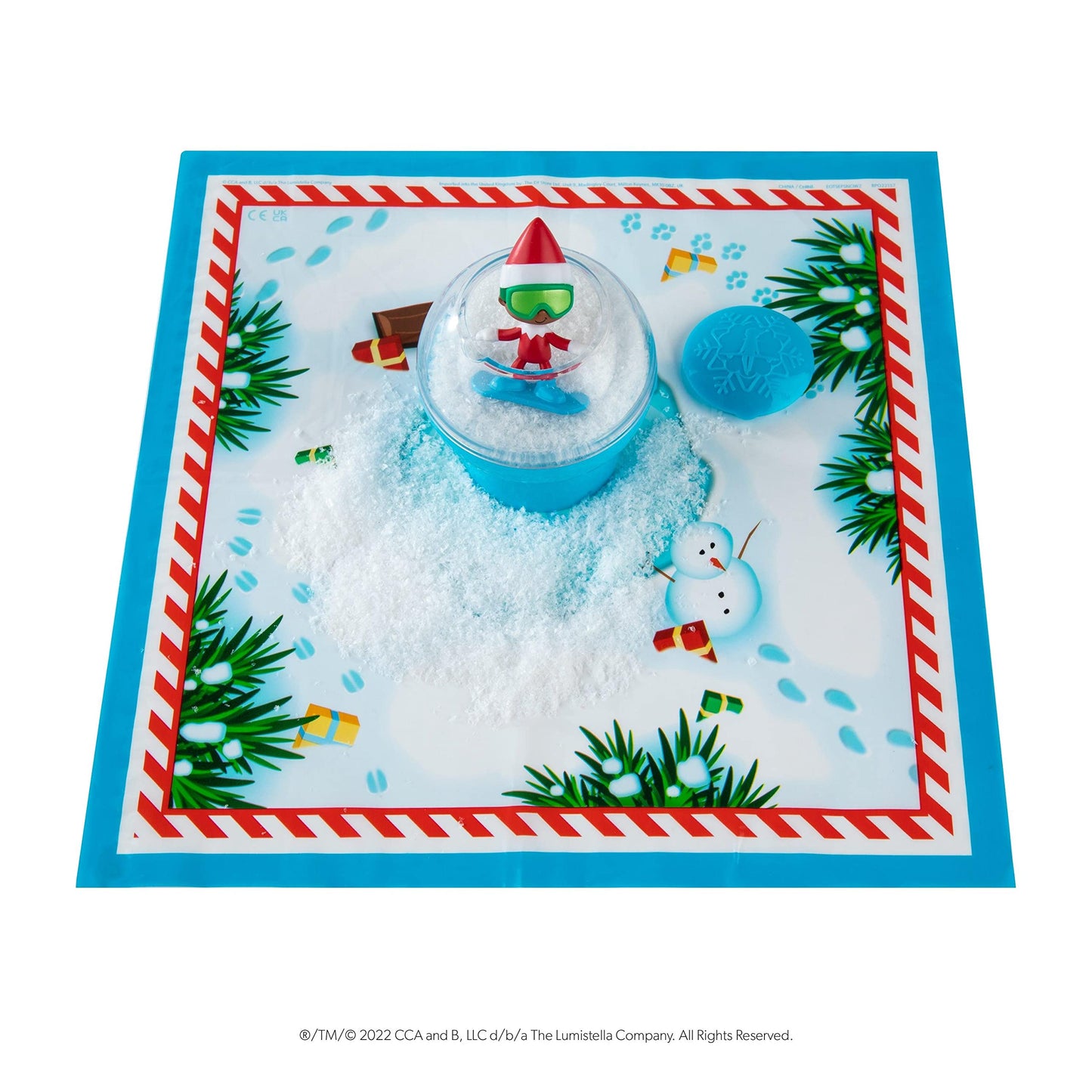 The Elf on the Shelf Secret SnoPrize - Collect one of Eight Mystery mini Figures. Includes Magical Snow Packet!