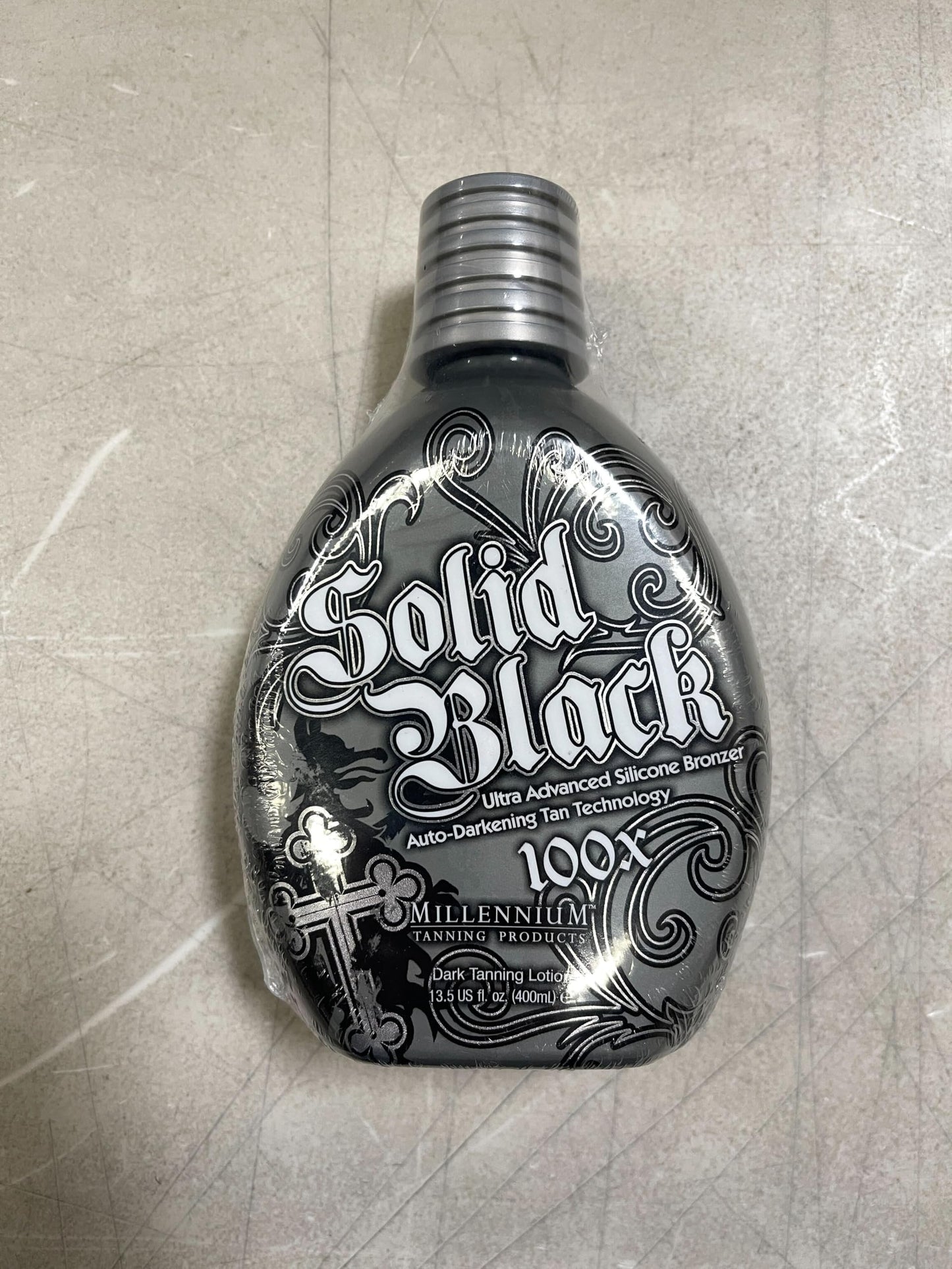 Millennium Tanning SOLID BLACK 100X Dark Tanning Lotion Indoor Outdoor Tan Enhancing Silicone Bronzer Tanning Bed Lotion 13.5 Fl oz (400 ml)