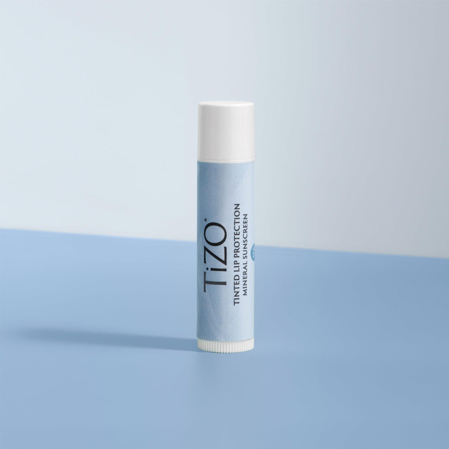 TiZO Lip Protection | Tinted | Broad Spectrum Sunscreen | UVA/UVB Protection | For all skin types | Titanium Dioxide and Zinc Oxide | 0.14 oz / 4.5 g