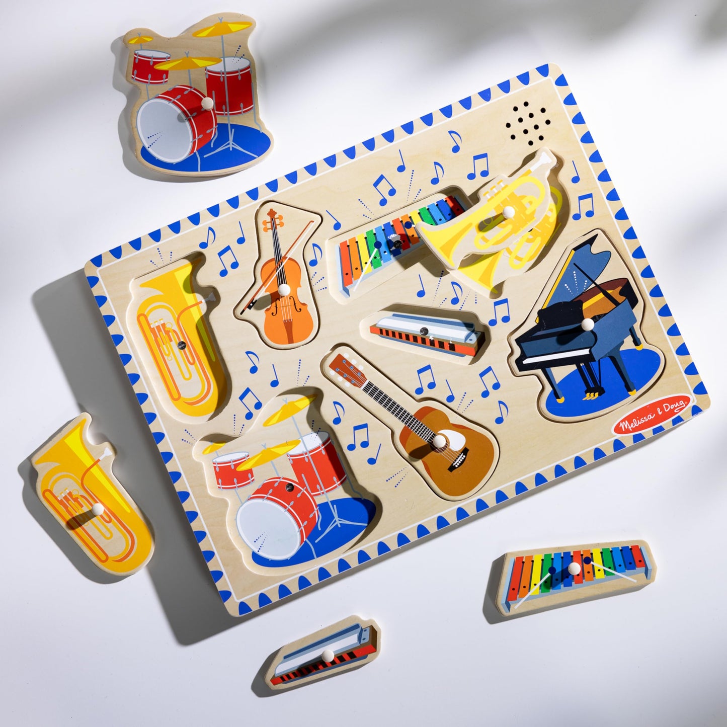 Melissa & Doug Musical Instruments Sound Puzzle – 8-Piece Wooden Peg Toy with Light-Activated Sounds, Music Learning Toy for Toddlers Ages 2+