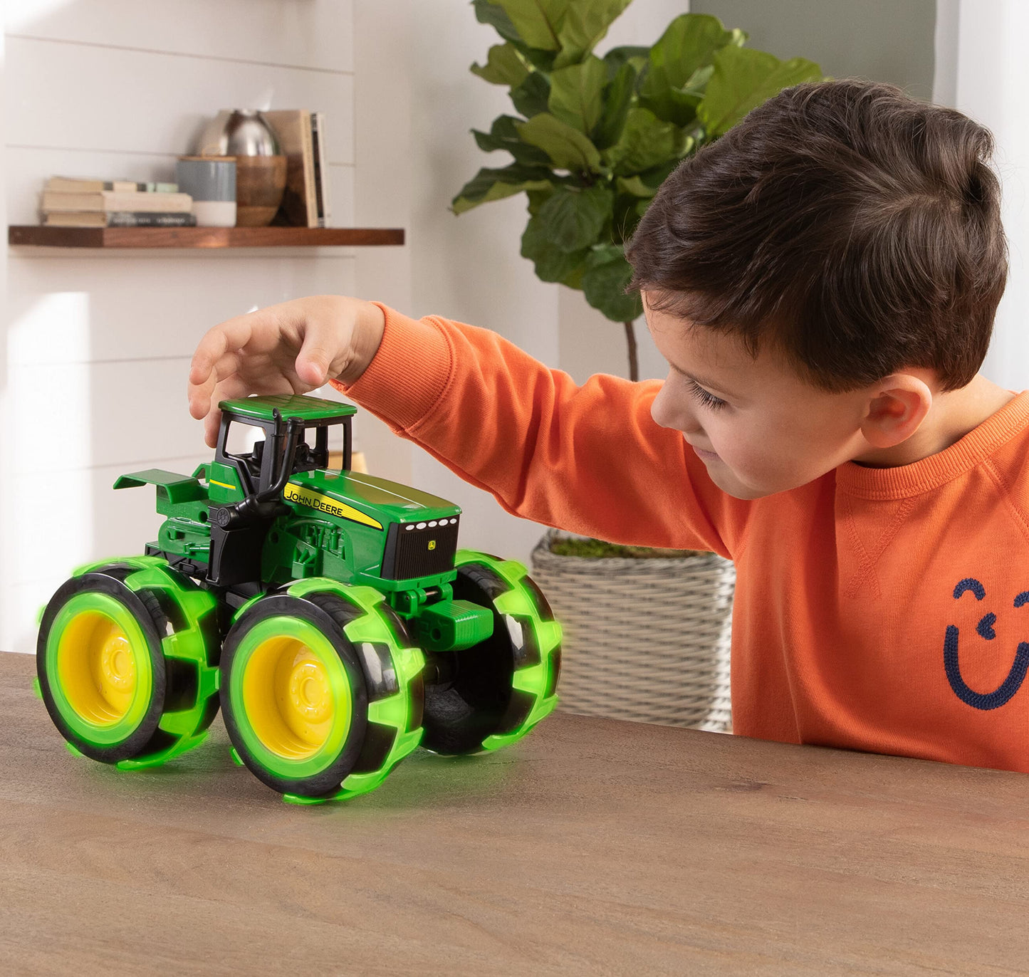 TOMY Monster Treads Lightning Wheels John Deere Tractor - Light-Up Motion Monster Truck Toy with Monster Tires for Ages 3+